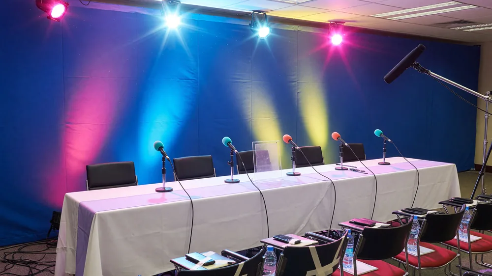 Press conference table setup for the Continental Major team huddle